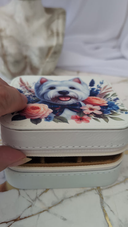Someone opening the westie travel jewellery box to show jewellery inside the box
