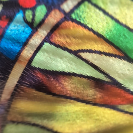 Video of stained glass style peacock chopping board