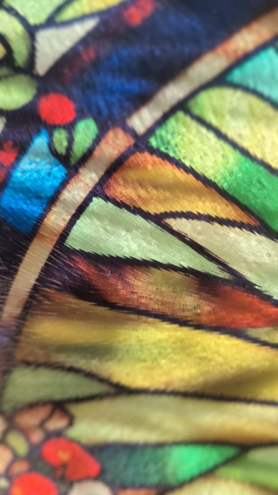 Video of stained glass style peacock chopping board