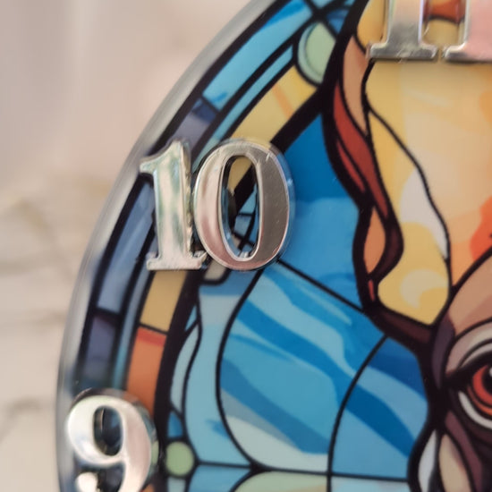 Video of 20cm round French Bulldog Wall clock in blue themed stained glass effect design, silver numerals and black clock hands