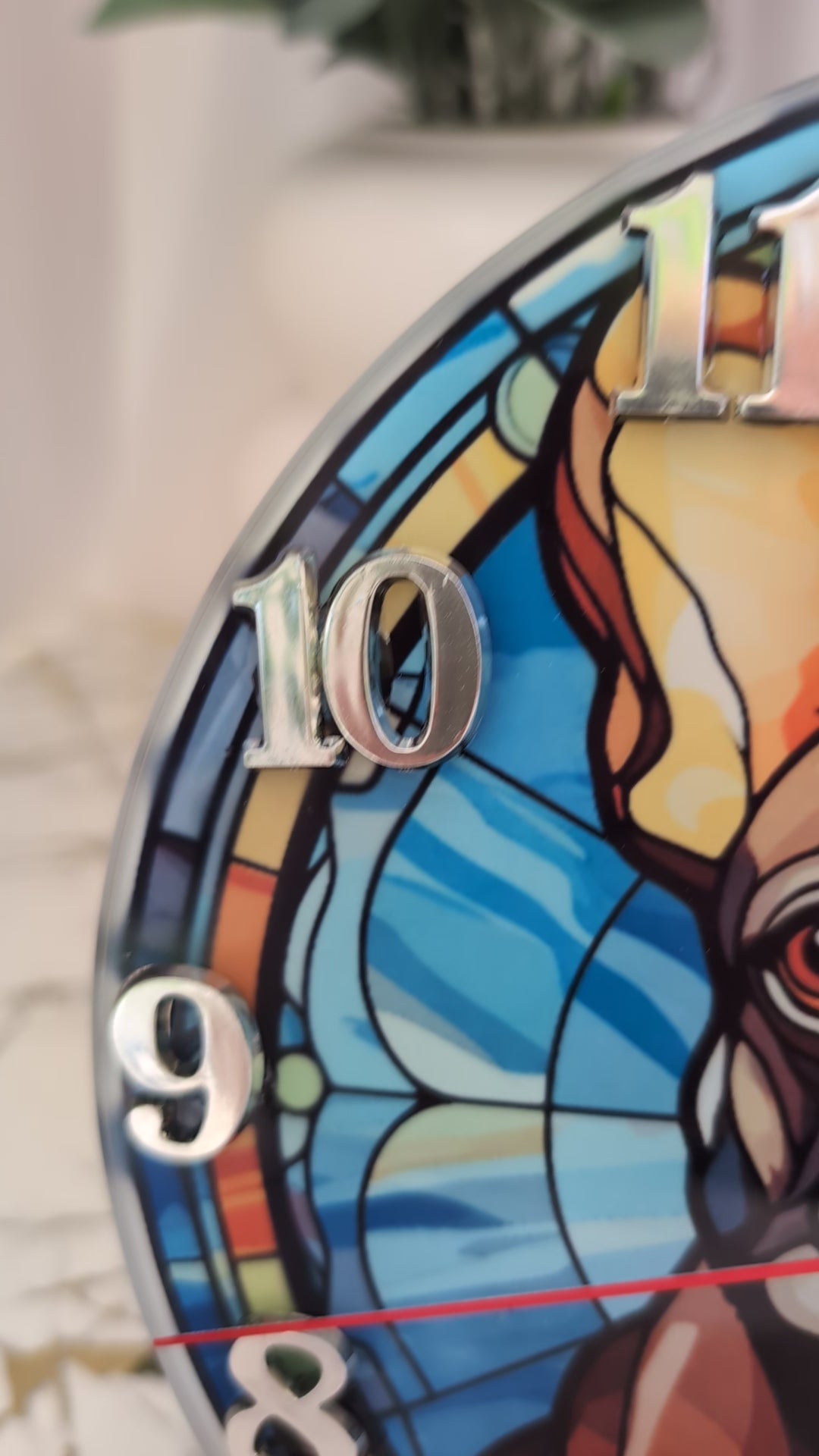 Video of 20cm round French Bulldog Wall clock in blue themed stained glass effect design, silver numerals and black clock hands