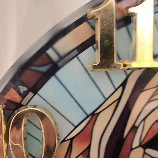 video of 20cm diameter, round,  stained glass style, Labrador wall clock with gold numbers and clock hands