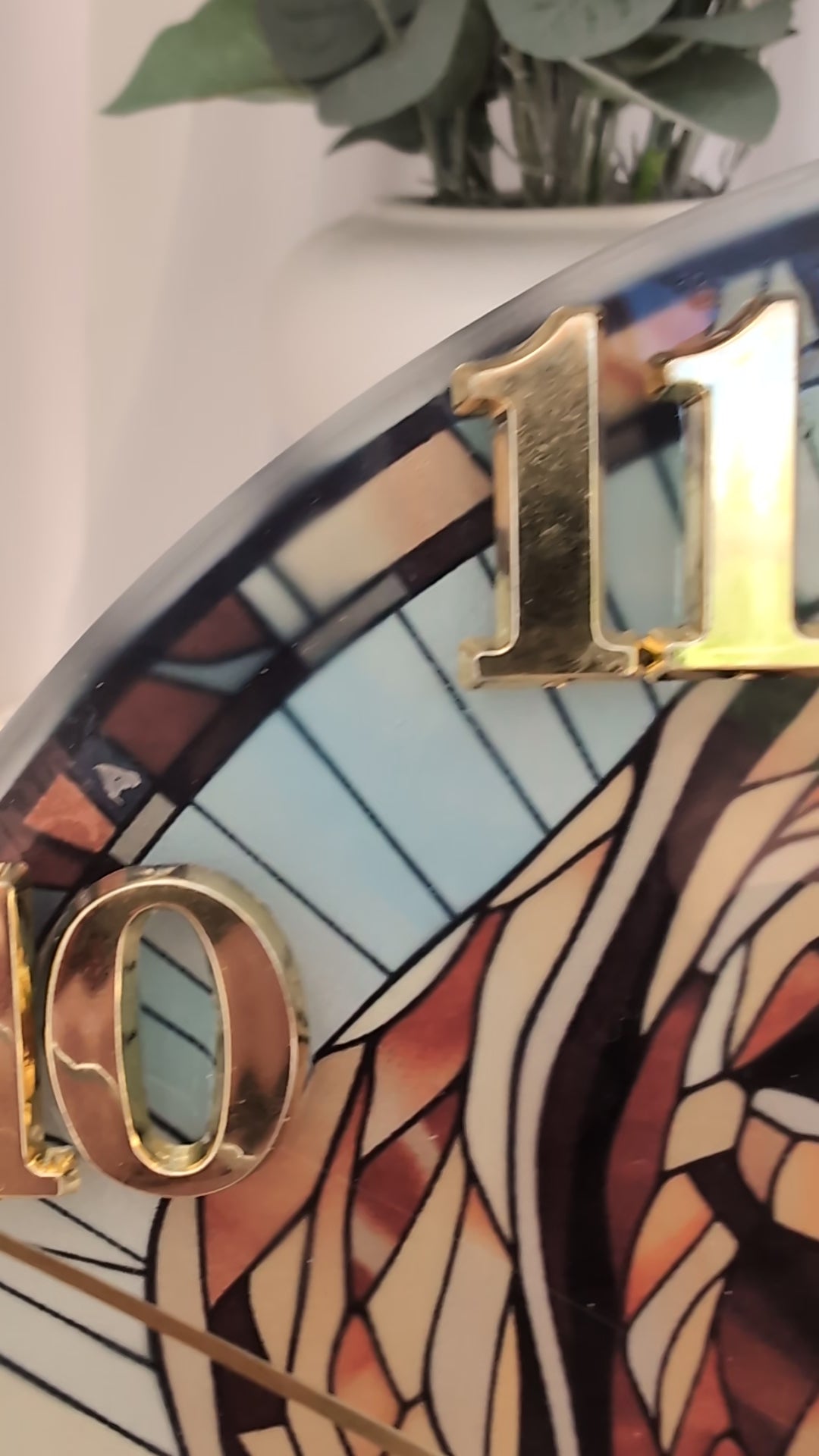 video of 20cm diameter, round,  stained glass style, Labrador wall clock with gold numbers and clock hands