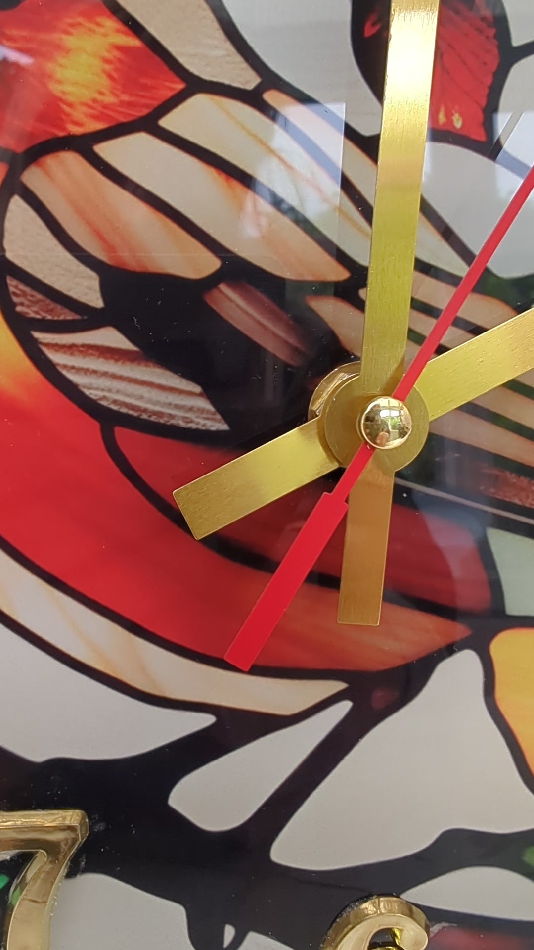 robin clock showcasing colour, shape, and elegant design for home décor.