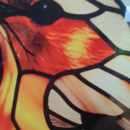 handmade robin clock with close-ups on the stained glass look and craftsmanship.