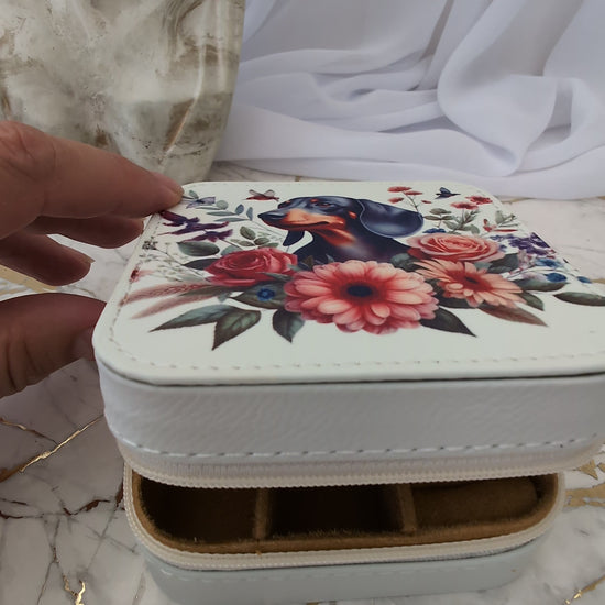 dachshund jewellery box being opened to show compartments inside