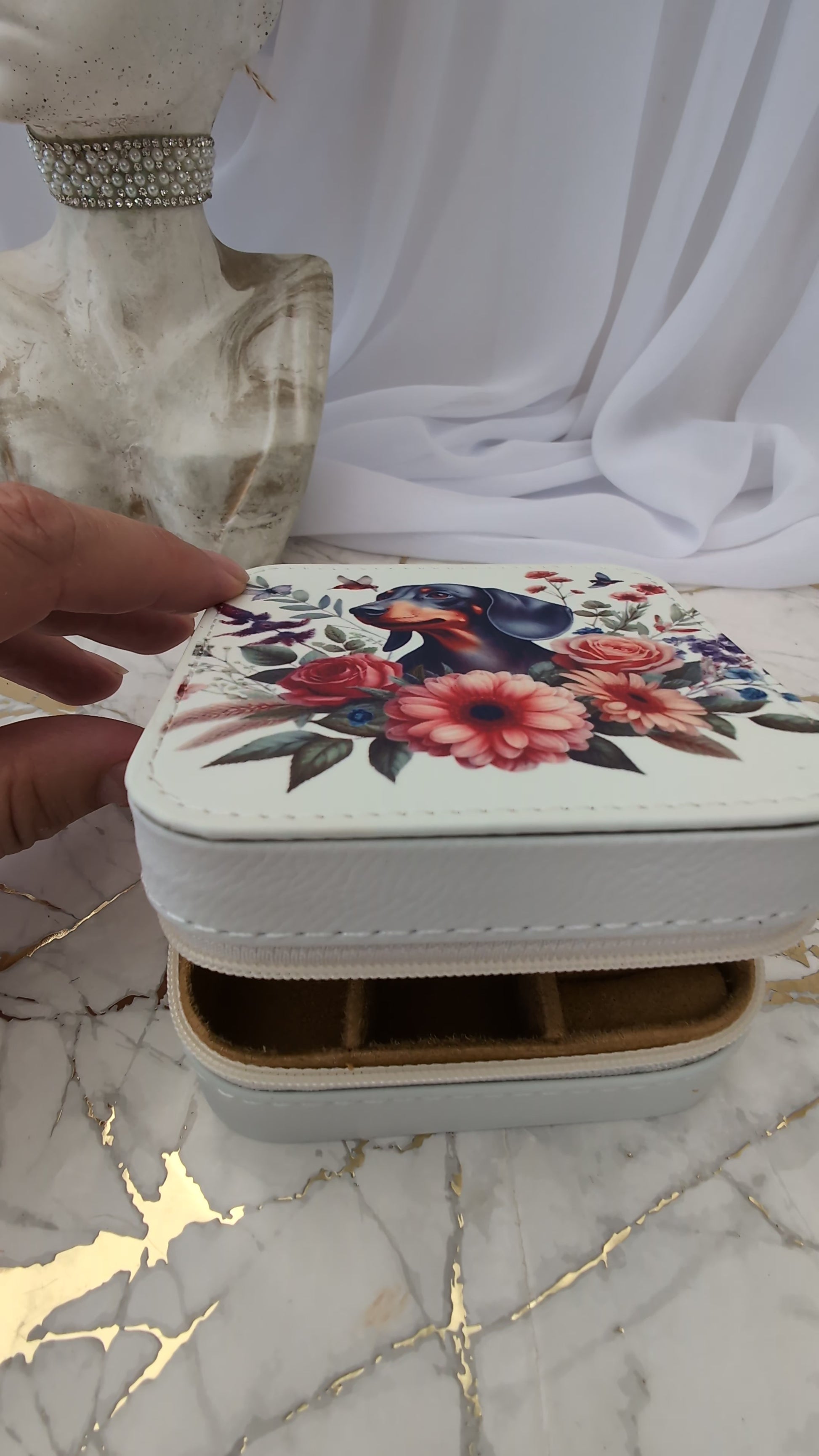 dachshund jewellery box being opened to show compartments inside