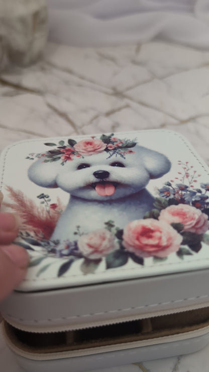 Bichon Frise travel jewellery box being opened to show inside compartments with jewellery