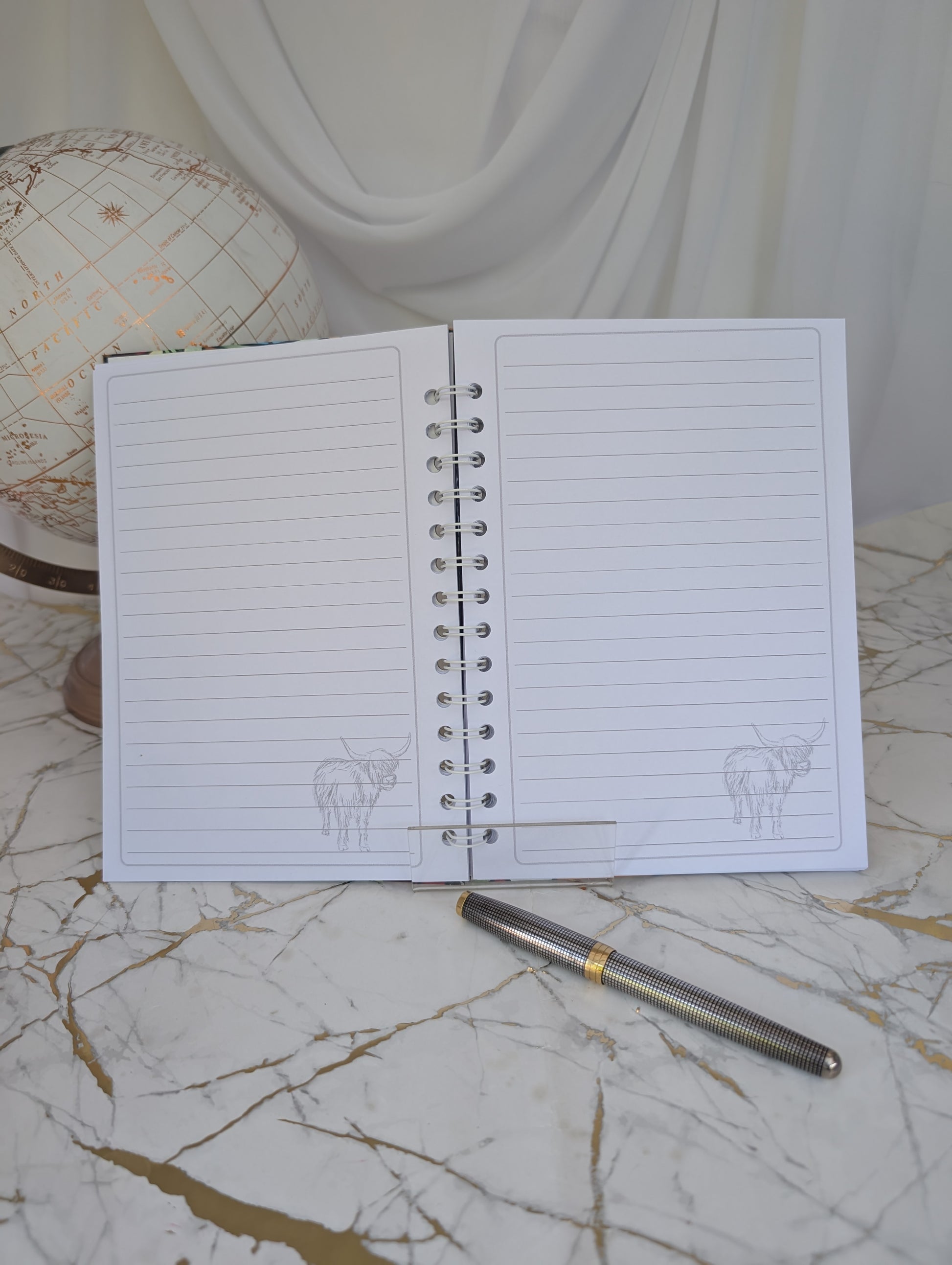 inside pages of highland cow notebook